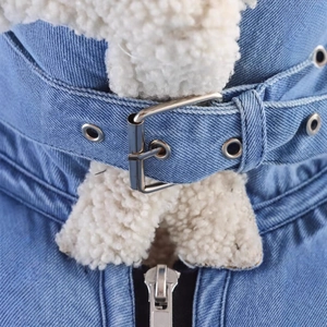 Blue denim biker jacket with white fleece lining and silver metal buckle collar detail