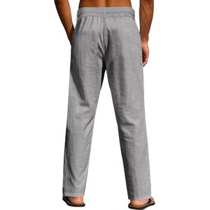 Detail view of men's linen casual pants in grey showing breathable fabric and elastic waist