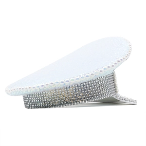 Detail of white captain hat featuring silver rhinestones and faux pearl trim for festivals