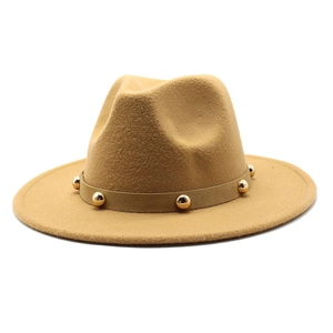 Detail of khaki fedora hat featuring wool felt texture and golden metal rivets on the band