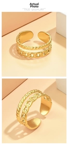 Detailed macro view of the double-layered chain design on the gold stainless steel ring