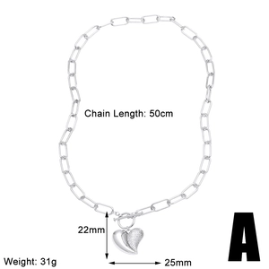 Detail view of silver heart pendant with dimensions 22mm x 25mm and 50cm chain length