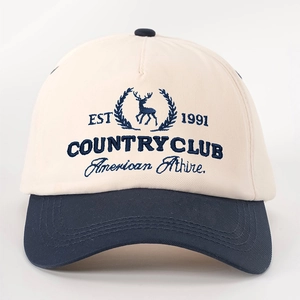 Close-up of the vintage navy blue embroidery and EST 1991 elk logo on the baseball cap