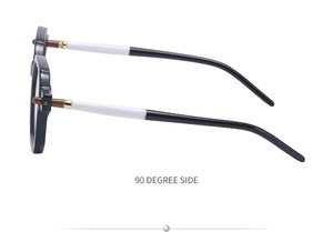 Detail of square black sunglasses frame with unique four-color spliced temple design