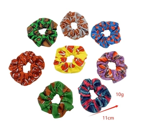Set of eight colorful rugby print scrunchies with soft fabric and elastic bands