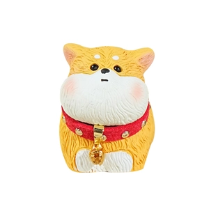 Cute Shiba Inu resin dog figurine with red collar and gold bell on white background