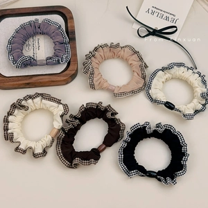 Set of 6 vintage houndstooth plaid scrunchies in purple, beige and black fabric