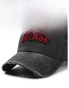 Detail of distressed vintage baseball cap with 3D embroidery and washed denim texture