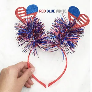 Sparkly USA flag heart headband with colorful tinsel pom-poms for festive parties