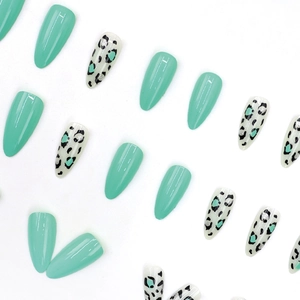 Glossy light green and leopard print almond press-on nails set on white background