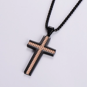 Black and rose gold stainless steel cross necklace with pyramid texture on white background