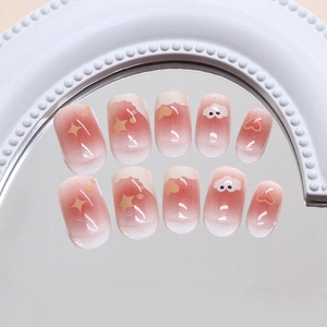 Sweet pink gradient press-on nails with cute cloud and star patterns on silver mirror