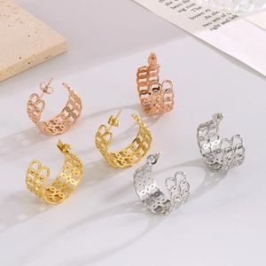 Three pairs of hollow chain-link earrings in gold, rose gold, and silver finishes
