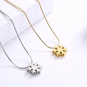 Minimalist snowflake necklace set in gold and silver finish with sleek snake chain