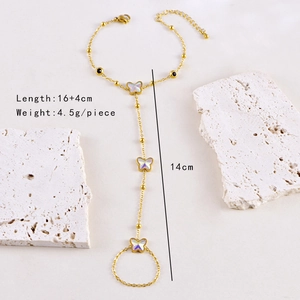 Detail of gold butterfly hand chain bracelet with size specs and weight measurement