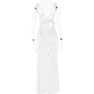Detail of the white backless satin maxi dress showing the V-neck straps and silky fabric