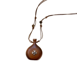 Retro wooden gourd necklace with a silver cross pendant and tiger eye bead on woven cord