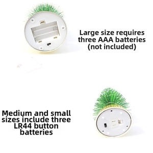 Detail view of mini LED Christmas tree base showing battery compartment and power switch