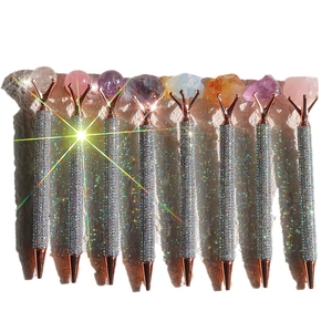 Elegant rose gold pens with sparkling silver barrels and colorful natural crystal toppers
