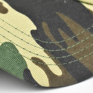 Close-up of reinforced parallel stitching on camouflage baseball cap brim detail