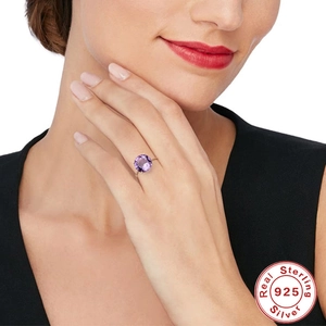 Luxurious S925 sterling silver ring with a large round-cut purple diamond centerpiece