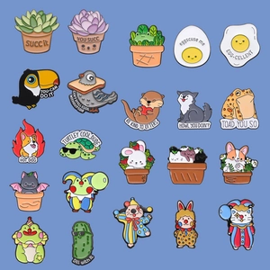 Collection of creative cartoon enamel pins featuring animals and puns on blue background