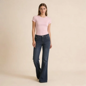 Detail of dark blue vintage wide-leg denim jeans with classic five-pocket styling
