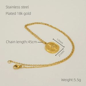 Detailed view of 18k gold plated stainless steel compass pendant with 45cm chain