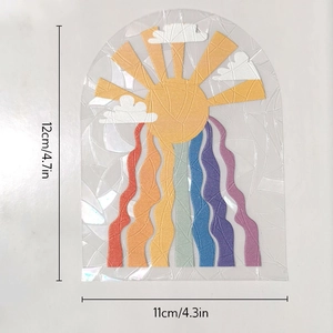 Detail view of rainbow prism window cling showing sun pattern and 12x11cm dimensions