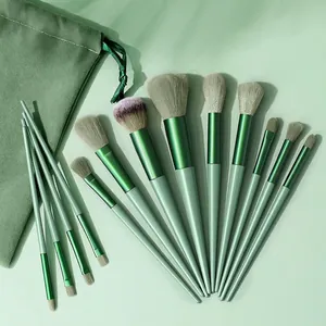 Set of 13 professional dark green makeup brushes with soft bristles and storage pouch