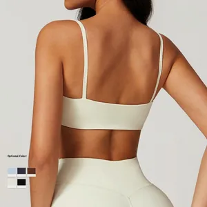 Eco-friendly quick-dry sports bra and leggings set with open back design in beige