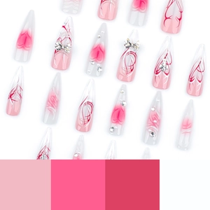 Pink gradient stiletto press-on nails with 3D metal bows, hearts and rhinestones