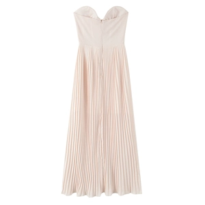 Detail of the back invisible zipper and pleated texture on an elegant strapless maxi dress