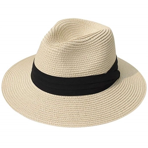 Foldable beige straw Panama hat featuring a wide black ribbon band for sun protection
