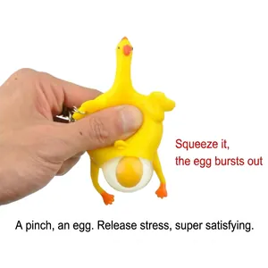 Funny squeeze egg-laying chicken keychain toy for stress relief and gag gift purposes