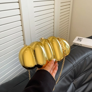 Cloud-shaped gold metallic evening clutch bag with striped marble texture and chain strap