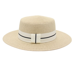 Chic beige straw boater hat with a contrast stripe ribbon and bow, minimalist summer sun hat