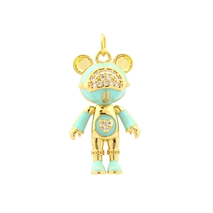 Close-up of a gold-plated bear pendant with blue enamel and sparkling zircon details