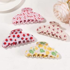 Set of four acrylic hair claws with cherry, strawberry and lemon fruit patterns