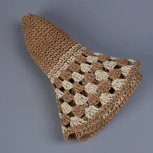 Foldable handmade crochet sun hat showing portable design and woven texture details