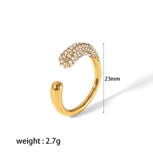Macro detail of 23mm 18K gold stainless steel hoop ring with embedded pavé crystals