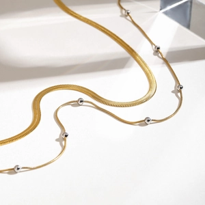 Collana a due strati in acciaio inossidabile bicolore oro argento con perline