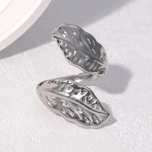 Minimalist stainless steel open ring featuring a double leaf design with detailed texture