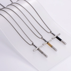 Three hip hop stainless steel cylinder cross necklaces in silver, gold, and black colors