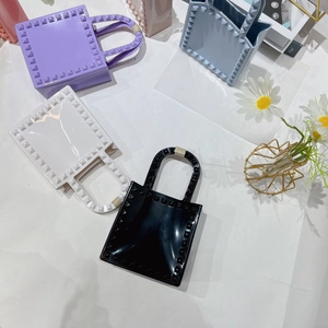 Mini PVC jelly handbags with rivet studs in purple white black and light blue colors
