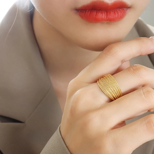 Chic multi-layered gold wide ring with beaded texture for women in a minimalist style
