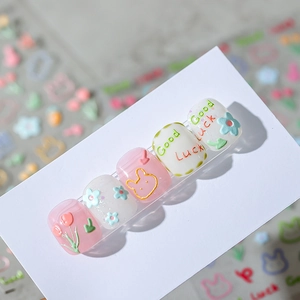 3D floral nail art stickers with pink tulips, cute rabbit designs and Good Luck lettering