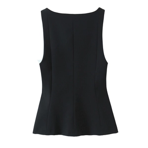 Detail of black sleeveless peplum top featuring fitted waist and ruffled flare hemline