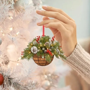 Detail of acrylic Christmas basket pendant with LED lights, red berries, and pine cones
