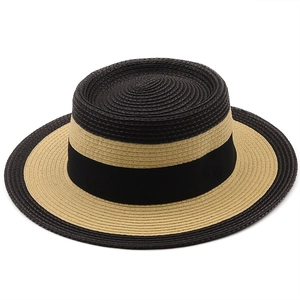 Chapeau de paille bicolore noir et beige à large bord avec ruban noir élégant